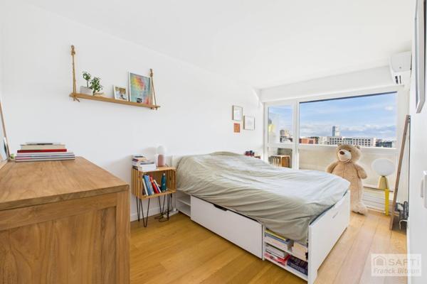 Gare d'Asnières. Dernier étage vue Seine. 3 pièces avec balcon, cave et parking en sus.