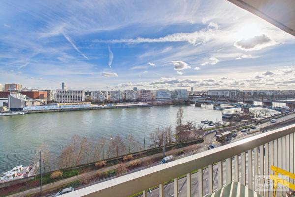 Gare d'Asnières. Dernier étage vue Seine. 3 pièces avec balcon, cave et parking en sus.