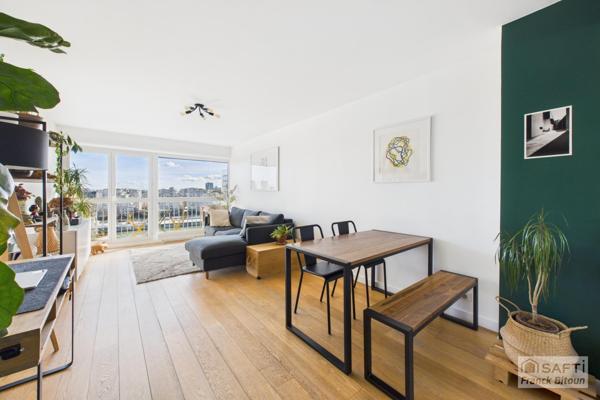 Gare d'Asnières. Dernier étage vue Seine. 3 pièces avec balcon, cave et parking en sus.