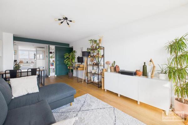 Gare d'Asnières. Dernier étage vue Seine. 3 pièces avec balcon, cave et parking en sus.