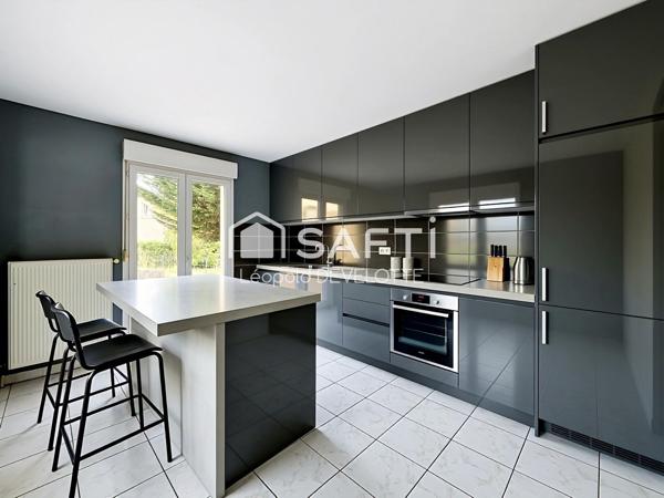 Superbe maison avec garage, terrasse et jardin