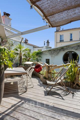 Duplex refait par architecte avec patio et terrasse