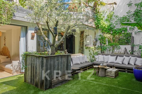 Duplex refait par architecte avec patio et terrasse