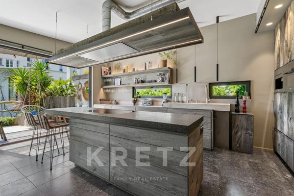 Duplex refait par architecte avec patio et terrasse