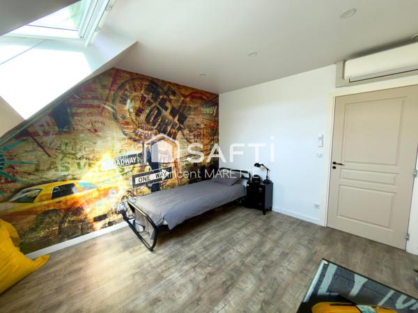Posez vos valises dans cette élégante maison connectée avec jardin, piscine et terrasse