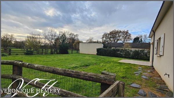 Superbe environnement pour cette maison 4 chambres avec grand garage