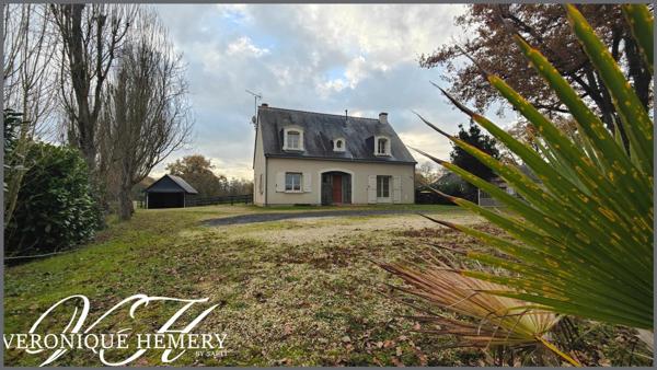 Superbe environnement pour cette maison 4 chambres avec grand garage