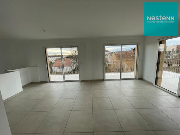 42600 - Appartement Dernier Etage - Etage privatisé - 126 m² - 3 chambres - garage et place de stationnement