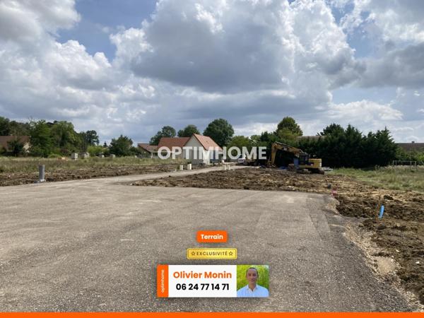 Au calme, cœur de village, terrain constructible et viabilisé de 920 m2