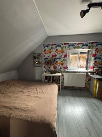 A vendre en exclusivité - Charmante maison 90 m2 avec jardin terrasse et garage, proche commodités à Ostwald