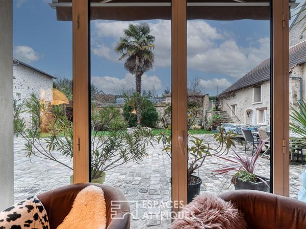 Le corps de ferme rénové avec jardin sans vis-à-vis