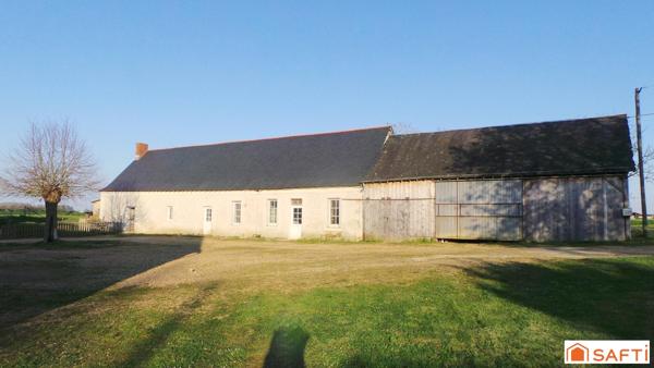 Bien rare ancien corps de ferme avec grange restaurée en maison d'habitation et longère