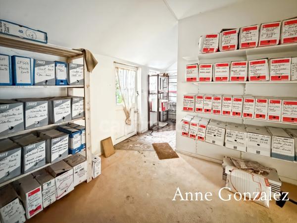 Ensemble immobilier à vendre centre bourg de la LA FERTE SAINT AUBIN : local comercial+appartement à rénover + dépendance + garage et deux places de parking