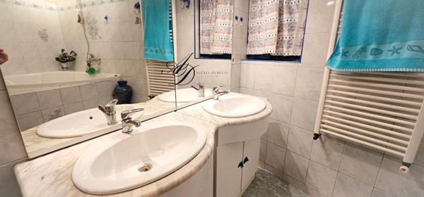 Maison familiale 5 pièces avec sous-sol aménagé, jardin arboré et prestations rares, env. 106 m² habitables / 186 m² au sol