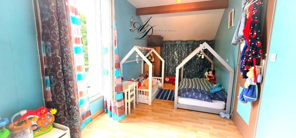 Maison familiale 5 pièces avec sous-sol aménagé, jardin arboré et prestations rares, env. 106 m² habitables / 186 m² au sol