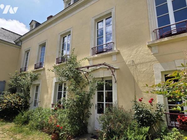 Maison de caractère centre ville, 219m² habitables avec 5 chambres, 2 bureaux, garage et jardin