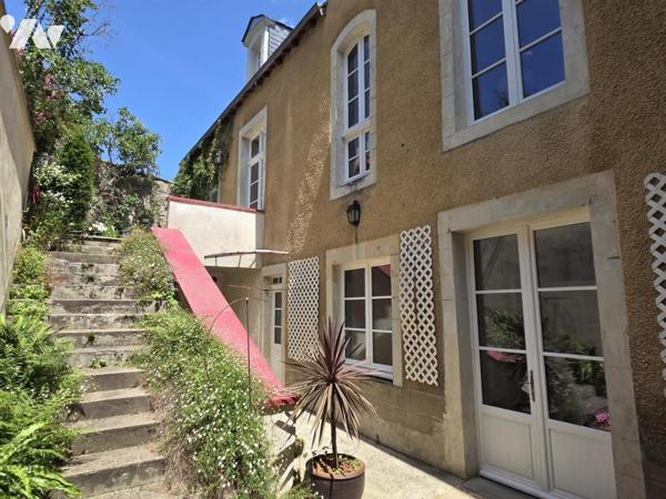 Maison de caractère centre ville, 219m² habitables avec 5 chambres, 2 bureaux, garage et jardin