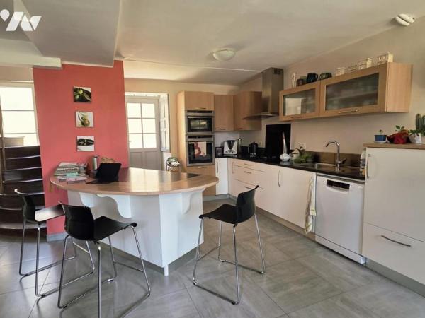 Maison de caractère centre ville, 219m² habitables avec 5 chambres, 2 bureaux, garage et jardin