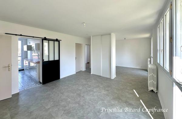 Appartement T4 en rez-de-chaussée avec jardin privatif et cave