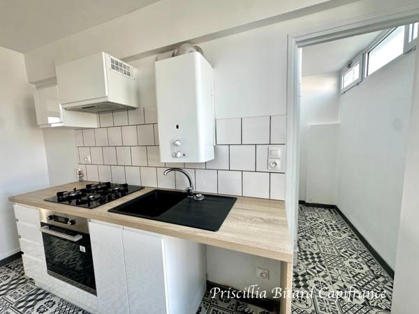 Appartement T4 en rez-de-chaussée avec jardin privatif et cave