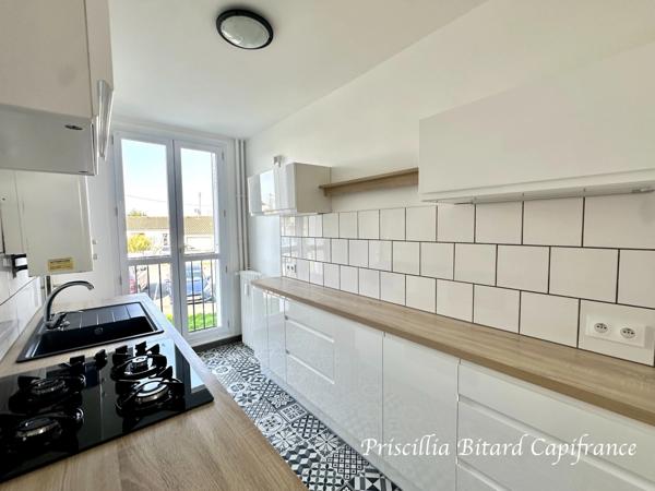 Appartement T4 en rez-de-chaussée avec jardin privatif et cave