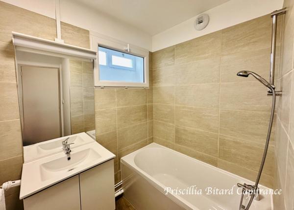 Appartement T4 en rez-de-chaussée avec jardin privatif et cave