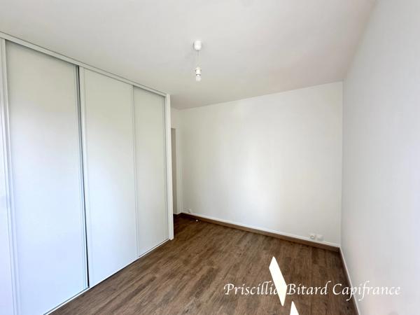 Appartement T4 en rez-de-chaussée avec jardin privatif et cave