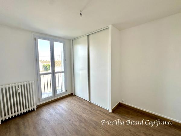 Appartement T4 en rez-de-chaussée avec jardin privatif et cave