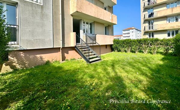 Appartement T4 en rez-de-chaussée avec jardin privatif et cave