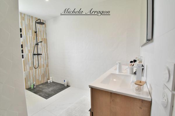 Maison contemporaine 2025 Villeneuve-sur-Lot (47) – 3 chambres dont suite parentale, pièce de vie 56 m², garage, terrain 1000 m², terrasse couverte, proche commerces