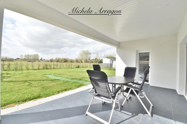 Maison contemporaine 2025 Villeneuve-sur-Lot (47) – 3 chambres dont suite parentale, pièce de vie 56 m², garage, terrain 1000 m², terrasse couverte, proche commerces