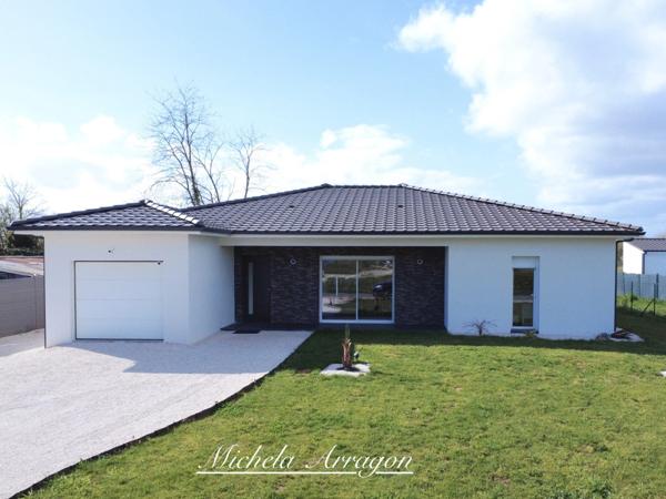 Maison contemporaine 2025 Villeneuve-sur-Lot (47) – 3 chambres dont suite parentale, pièce de vie 56 m², garage, terrain 1000 m², terrasse couverte, proche commerces