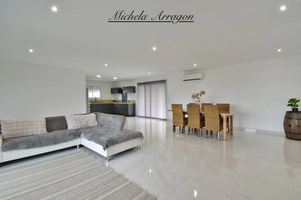 Maison contemporaine 2025 Villeneuve-sur-Lot (47) – 3 chambres dont suite parentale, pièce de vie 56 m², garage, terrain 1000 m², terrasse couverte, proche commerces