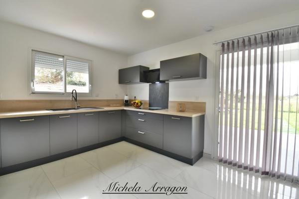 Maison contemporaine 2025 Villeneuve-sur-Lot (47) – 3 chambres dont suite parentale, pièce de vie 56 m², garage, terrain 1000 m², terrasse couverte, proche commerces