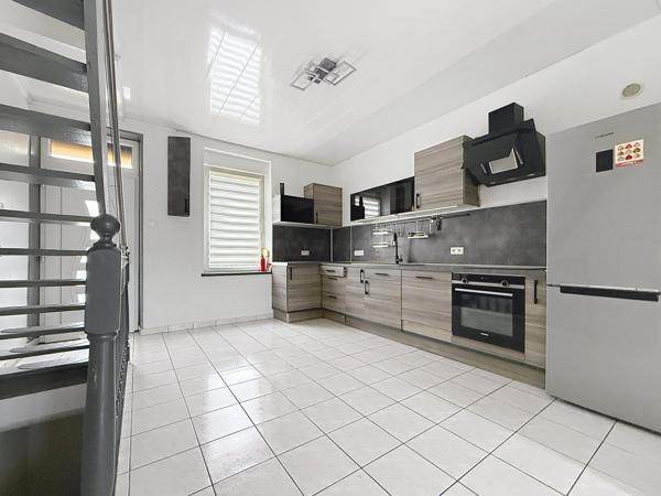 maison de cité 97 m2 3 chambres , jardin , garage possible.