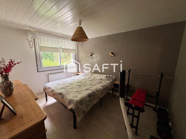 Appart T3 RDC surélevé, 77m2, cave et parking.