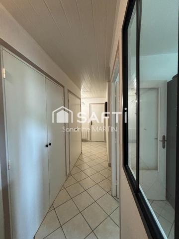 Appart T3 RDC surélevé, 77m2, cave et parking.