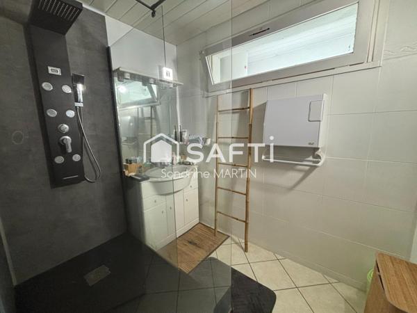 Appart T3 RDC surélevé, 77m2, cave et parking.