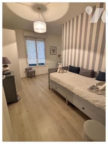 Maison traditionnelle avec garage et trois chambres 