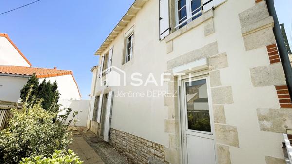 Maison familiale avec jardin et garage