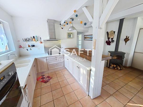 Maison traditionnelle de plain-pied au calme