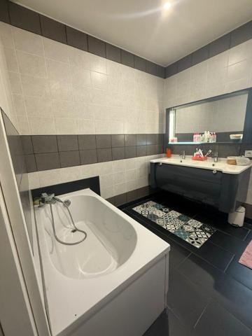 Maison de plain-pied 110 m² - 3 chambres - Jardin - Garage