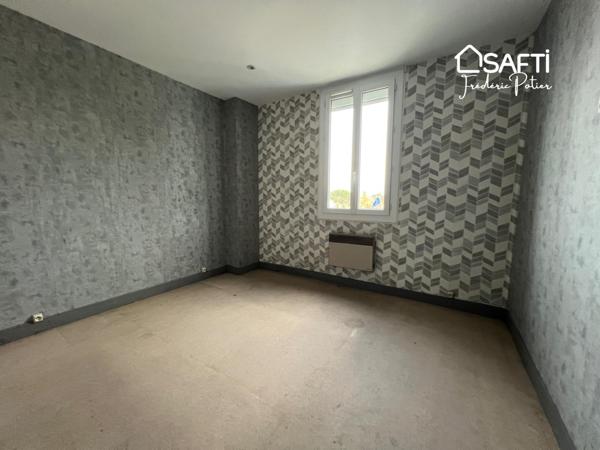 Maison de ville proches commerces et écoles