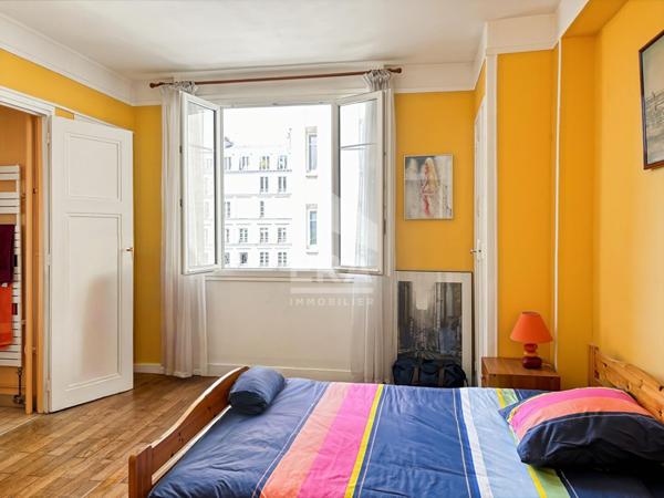 Passy centre - 73 m² élégant avec parquet bois massif