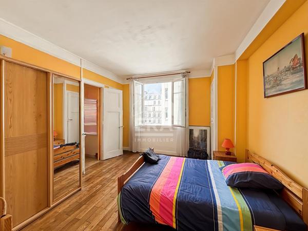 Passy centre - 73 m² élégant avec parquet bois massif