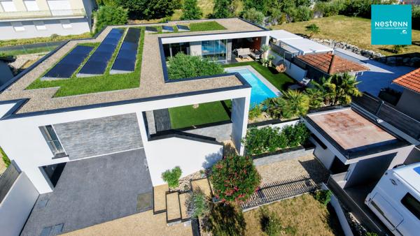 Saint-Just-Saint-Rambert : Maison d'architecte d'exception avec piscine miroir !