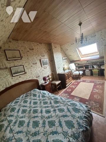 Une maison individuelle à usage d'habitation située à OSNY (95520).