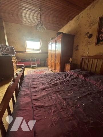 Une maison individuelle à usage d'habitation située à OSNY (95520).