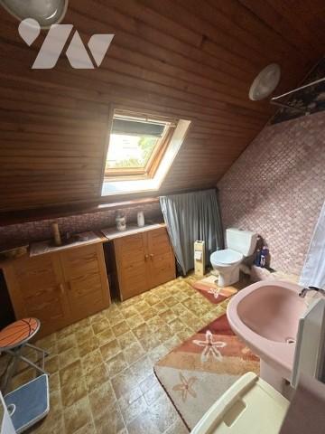 Une maison individuelle à usage d'habitation située à OSNY (95520).