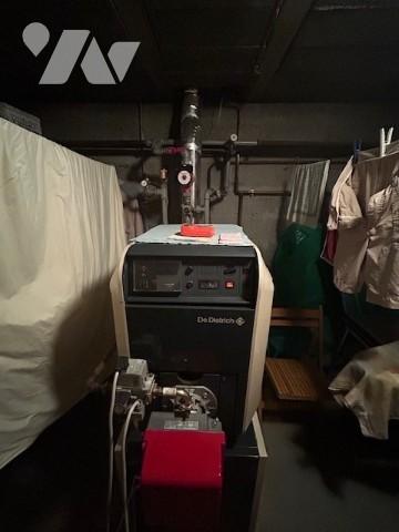 Une maison individuelle à usage d'habitation située à OSNY (95520).